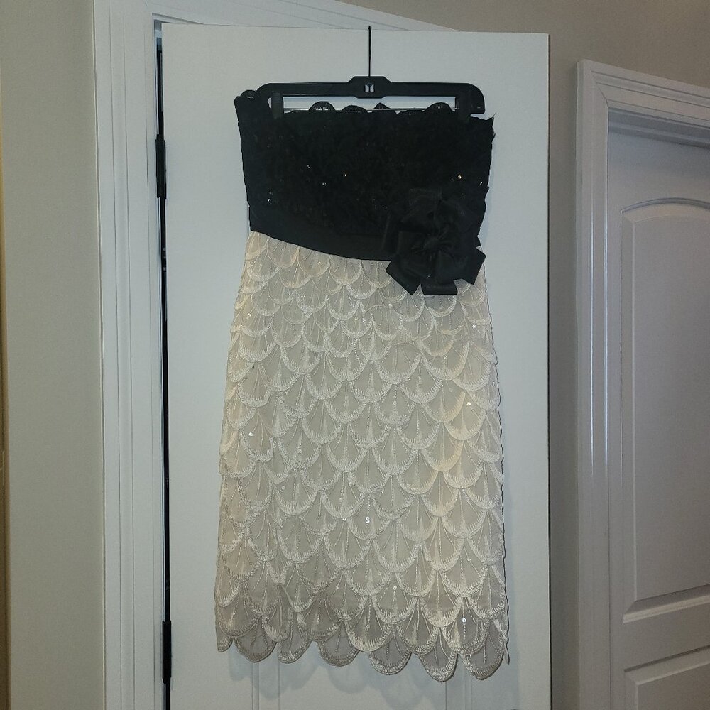 Black and white bodice style sequin peacock formal dress with bow